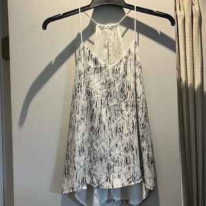 White and black dressy top, jersey/chiffon type material